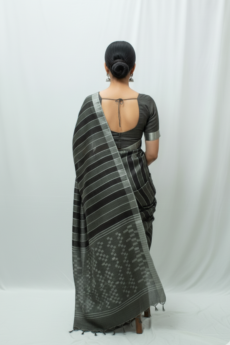 Staple body silver border black color silk Saree