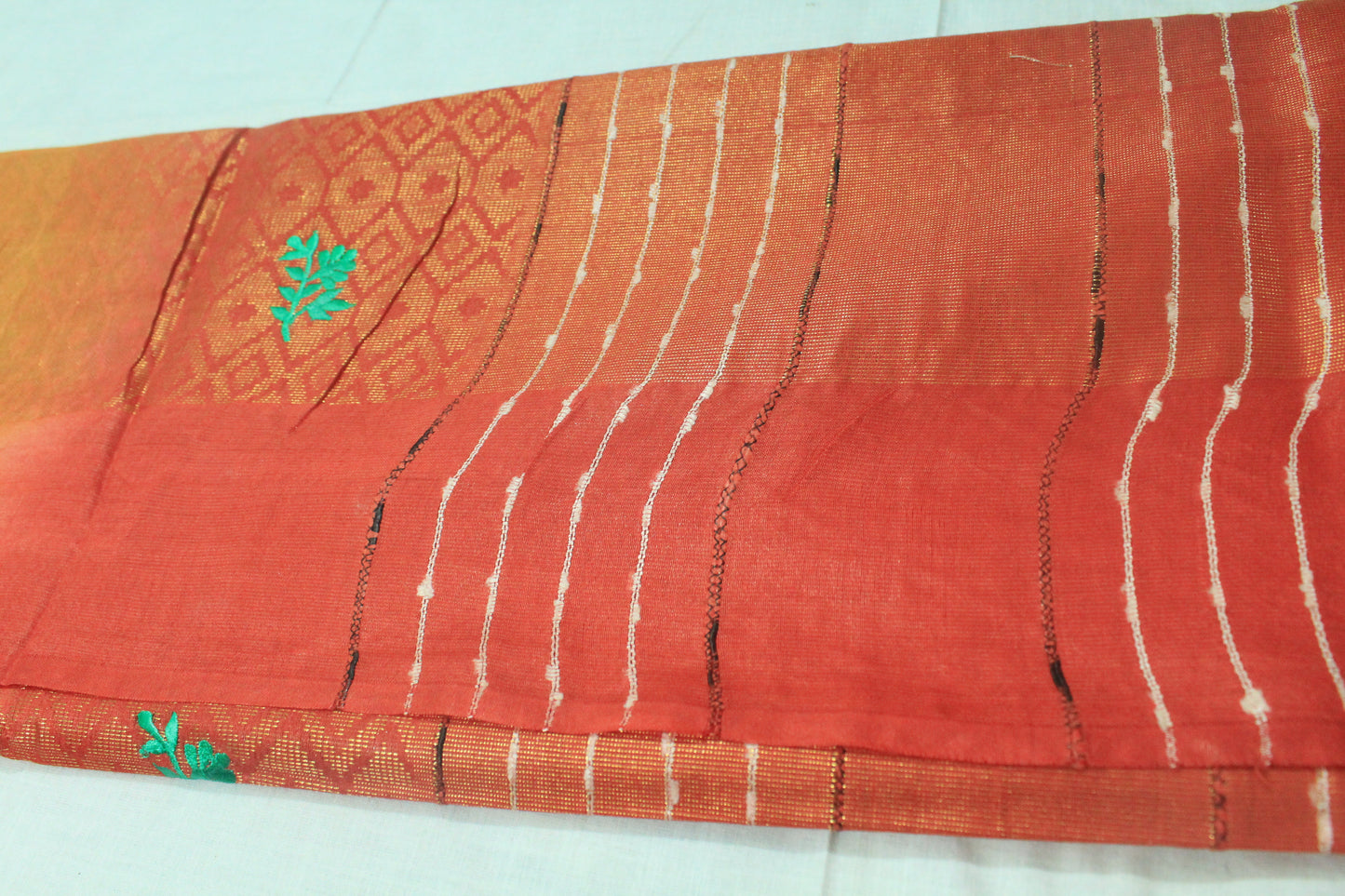 stunning festive saree with embroidery and gold zari work