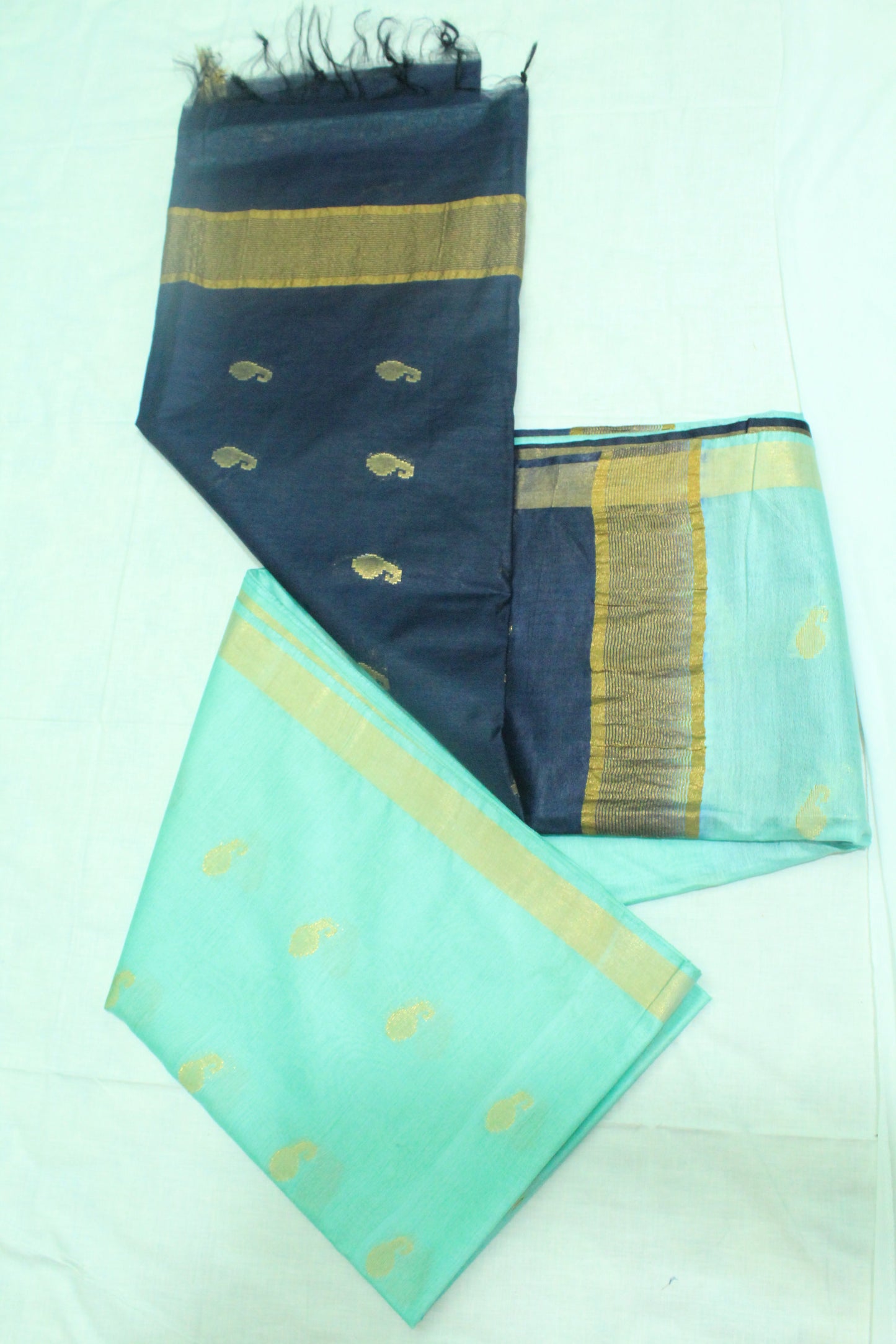golden zari buta plain border silk Saree with blue contrast
