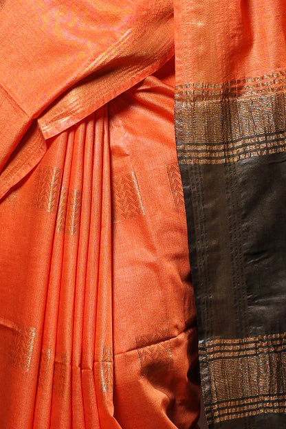 Orange saree with gold patterns in silk fabric