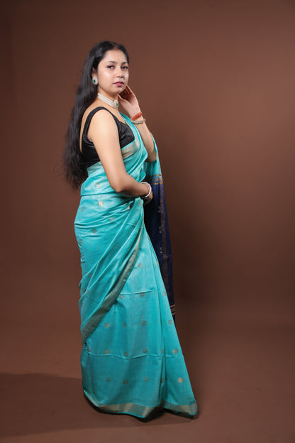 Blue color turquoise saree with golden zari