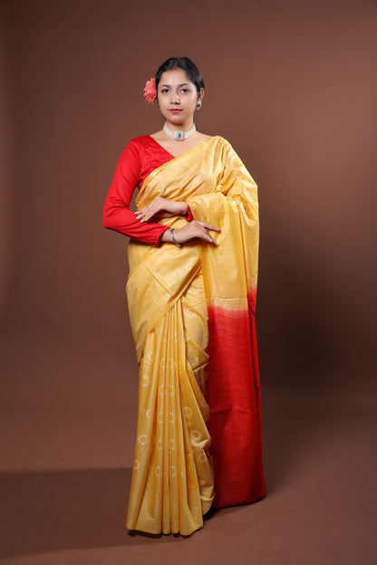 Festive Yellow color saree with gold patterns