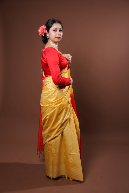 Festive Yellow color saree with gold patterns