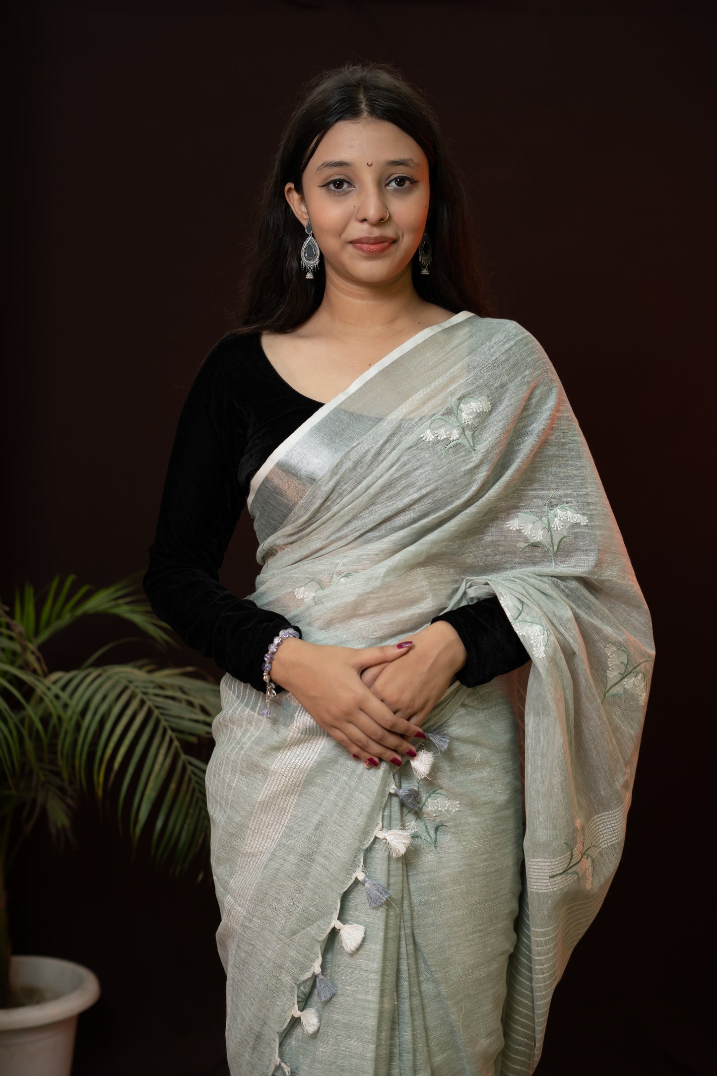 Linen Saree with enriched Silver color with beautiful embroidery
