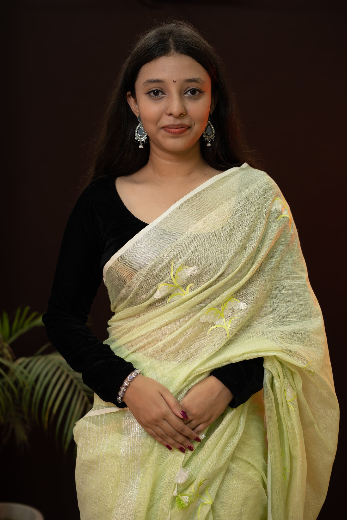 Yellow Saree in Linen fabric with zari border and embroidery work
