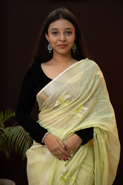 Yellow Saree in Linen fabric with zari border and embroidery work