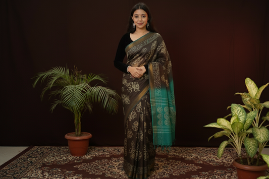 Teal and black patterned bhagalpuri saree in black color