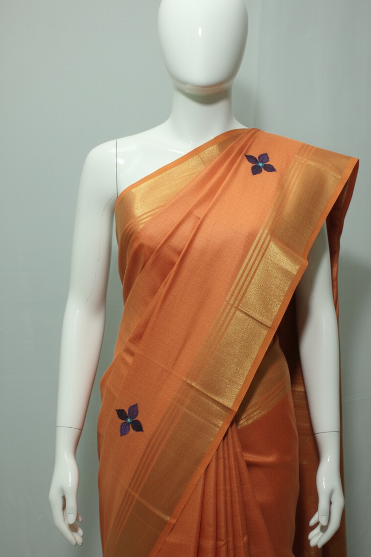 Embroided saree with golden zari border in orange color