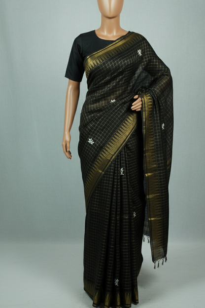 Embroidered golden zari work black color saree