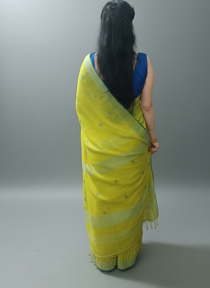 Bright yellow festive wear Saree with blue patches