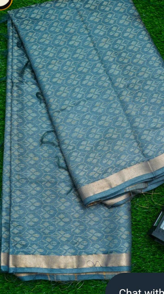 Blue saree with a  embroidered subtle pattern