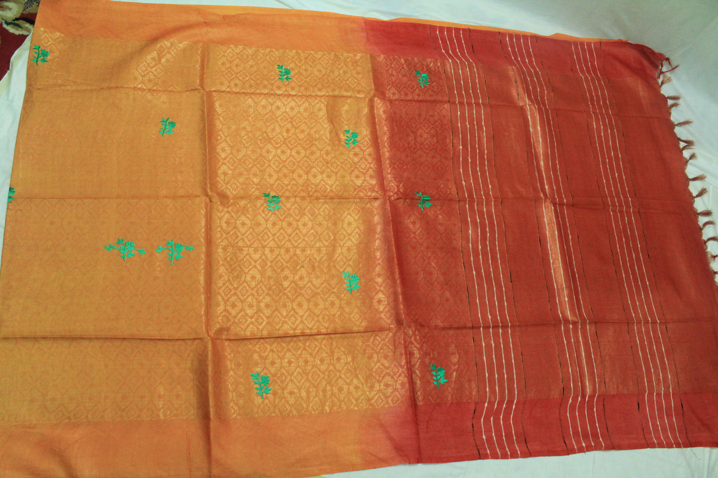 stunning festive saree with embroidery and gold zari work