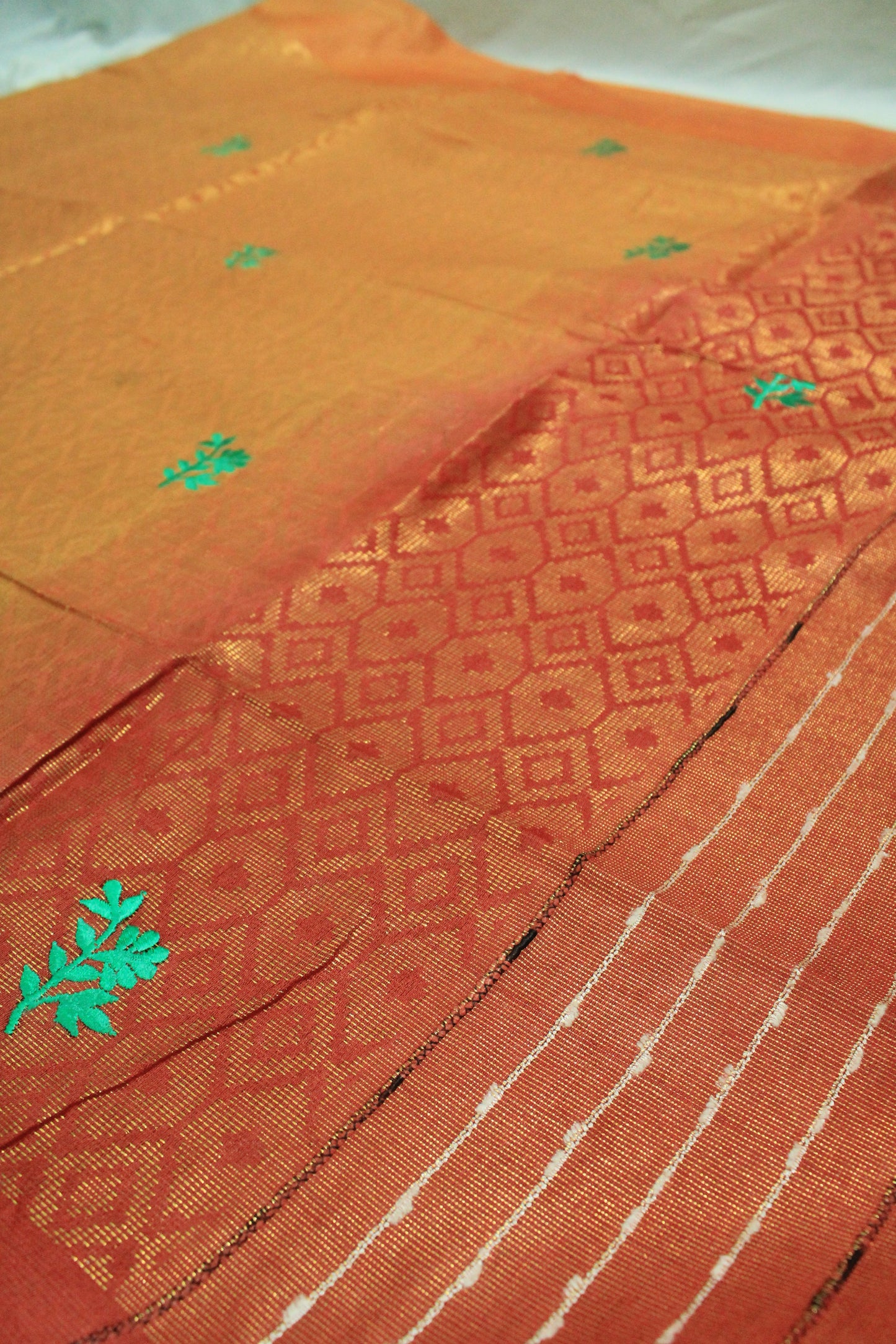 stunning festive saree with embroidery and gold zari work