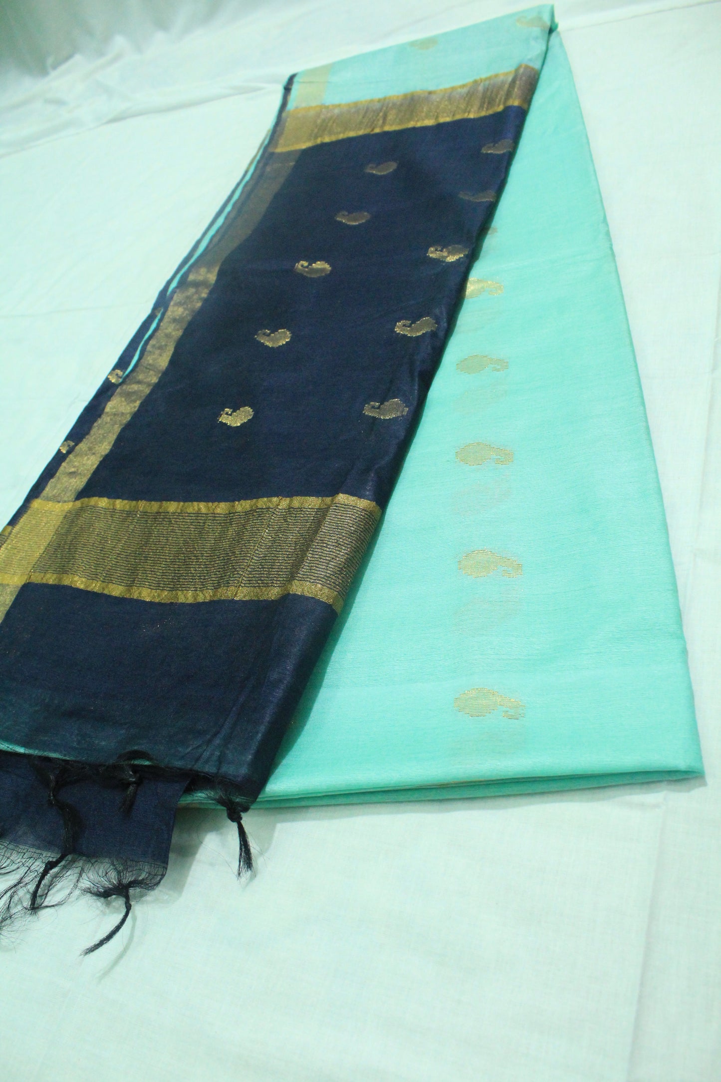 golden zari buta plain border silk Saree with blue contrast