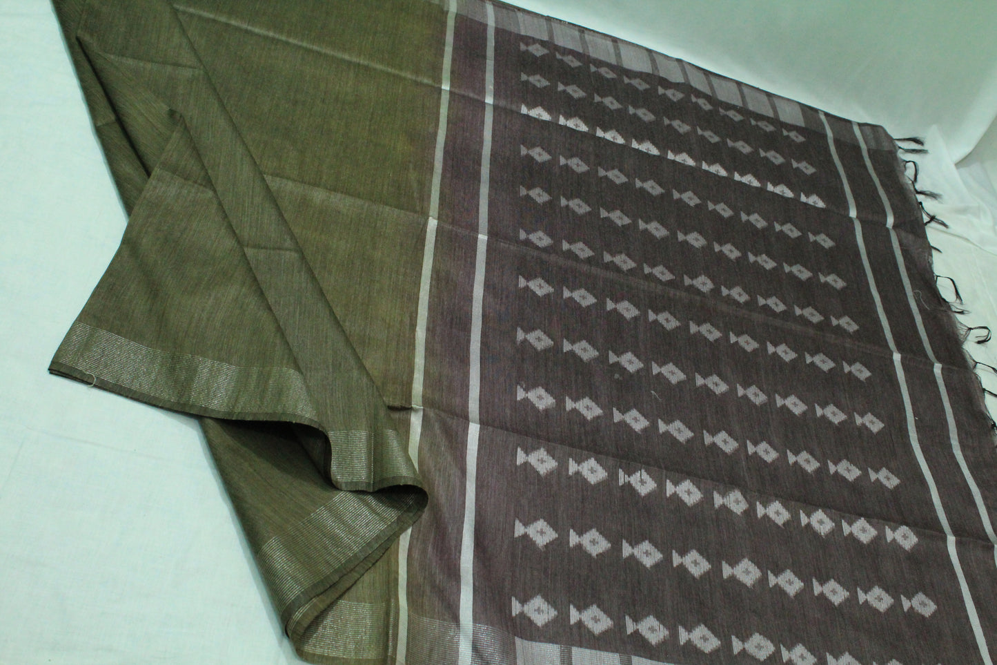 Grand pallu with silver zari pattern jute silk Saree
