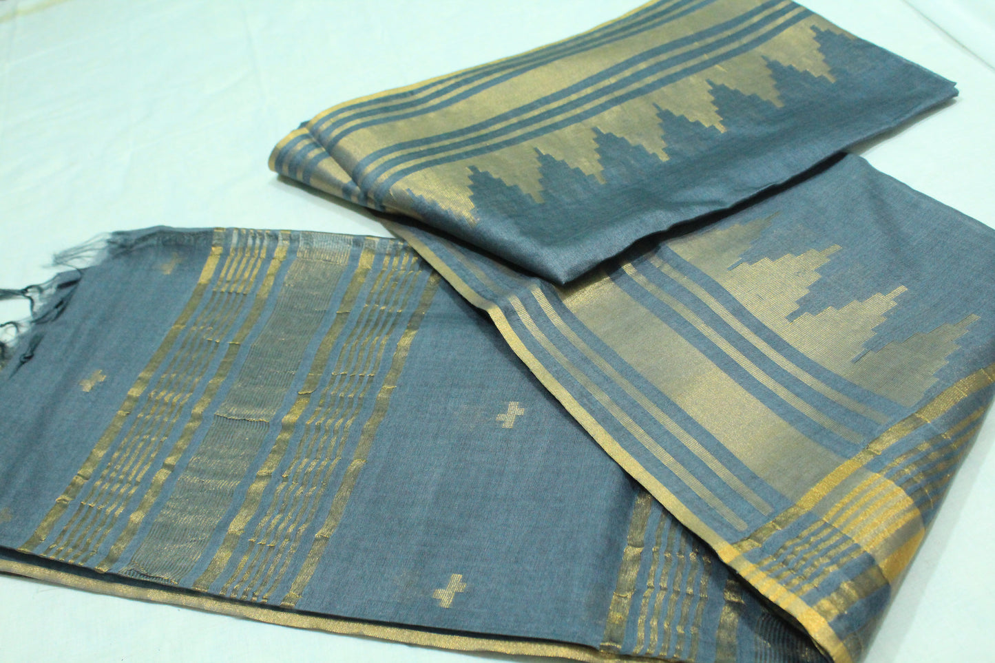 Golden zari buta temple border Silk Saree in rich grey color