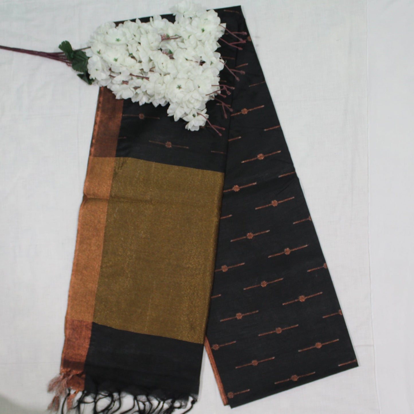 Black Saree with gold border and gold patches