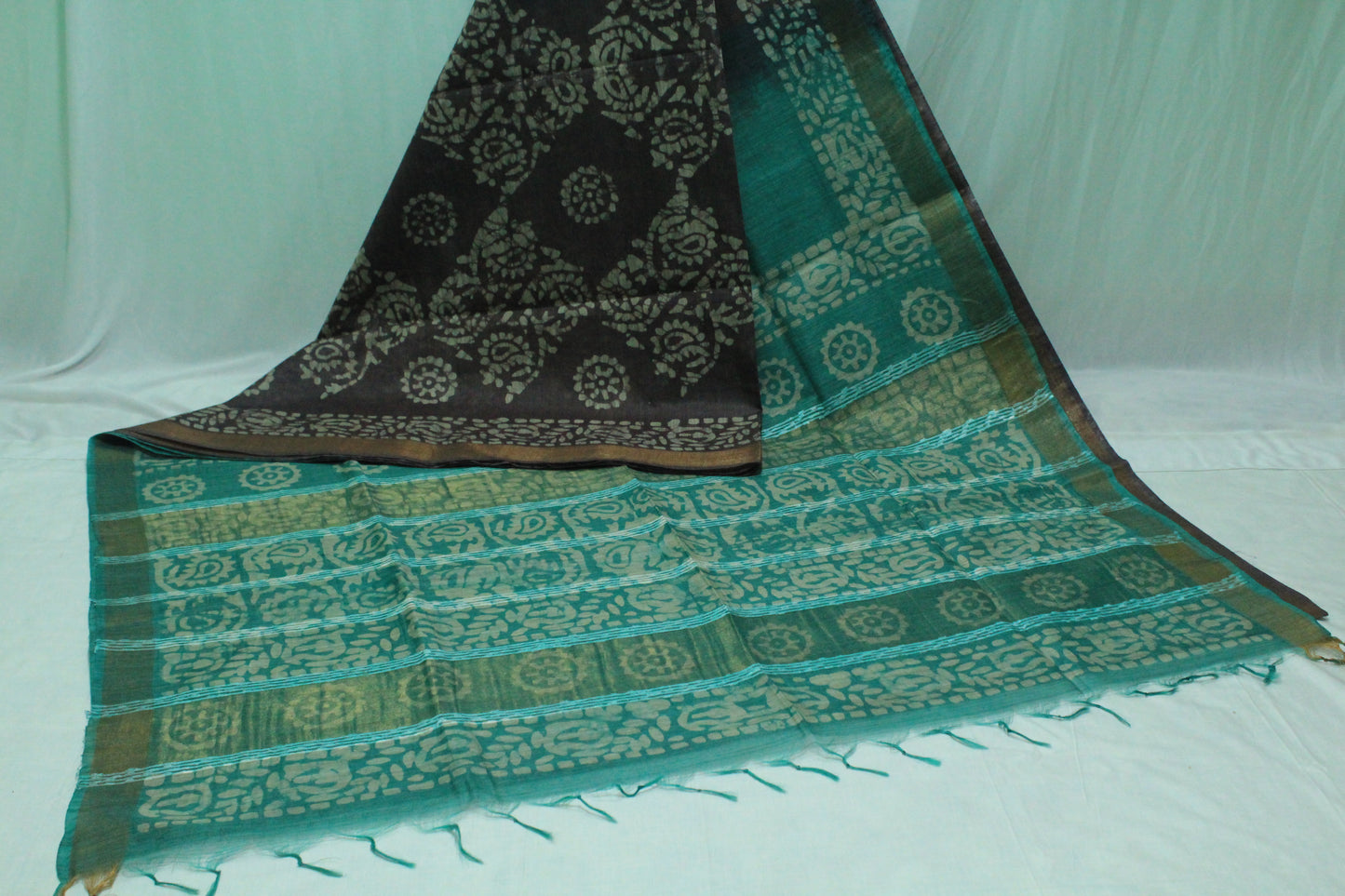Teal and black patterned bhagalpuri saree in black color