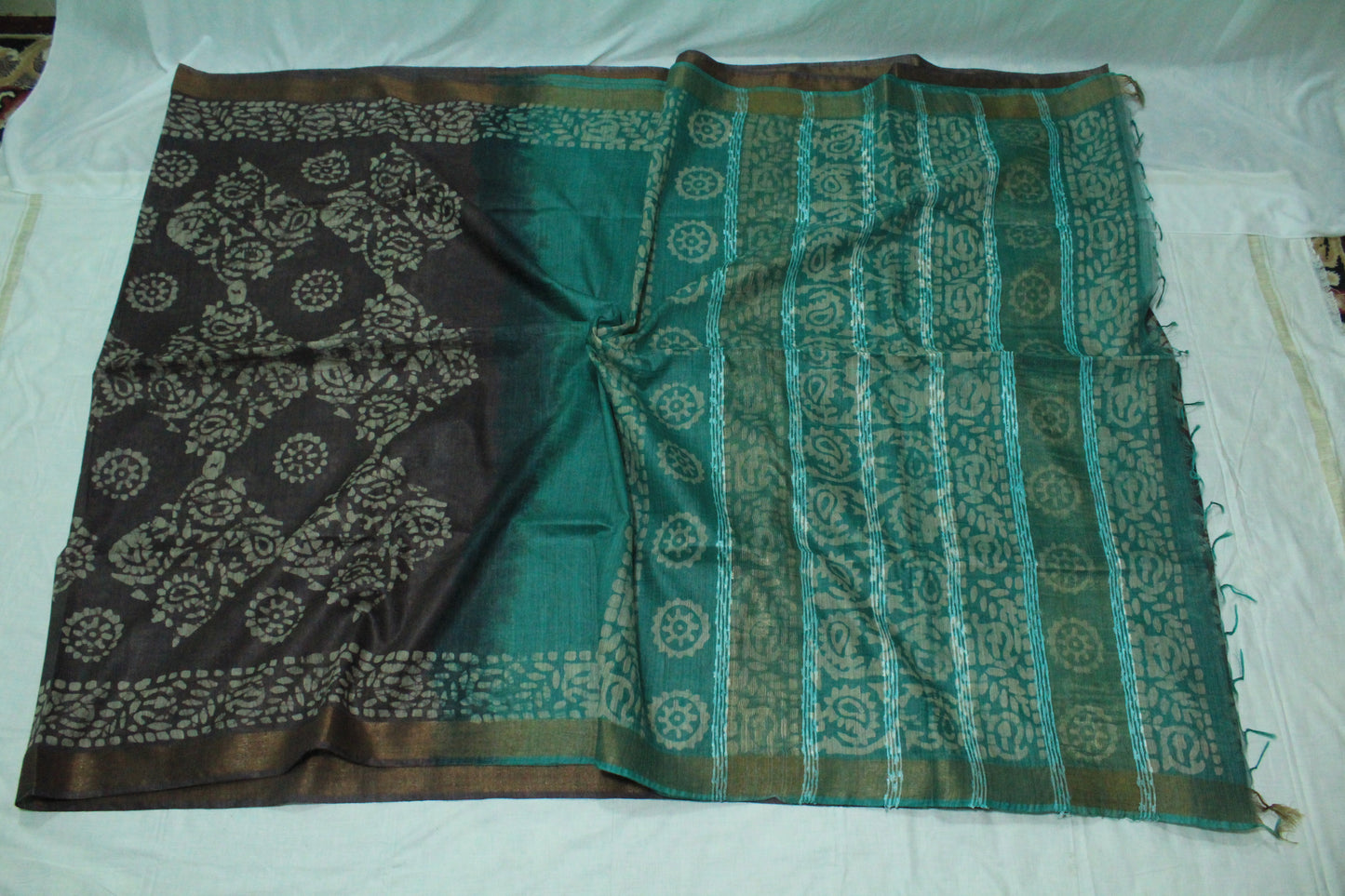 Teal and black patterned bhagalpuri saree in black color