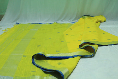 Bright yellow festive wear Saree with blue patches