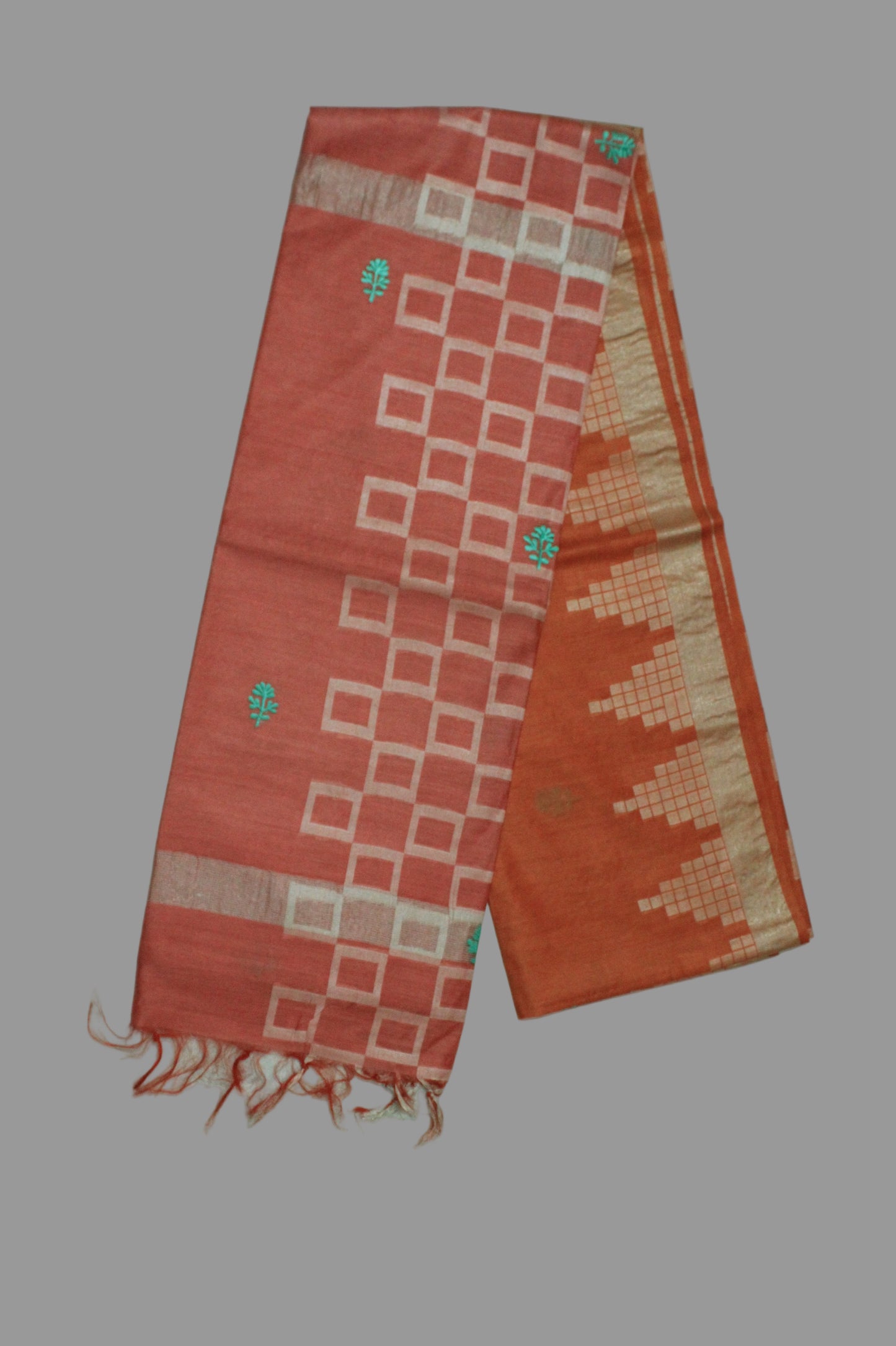 Embroidered festive orange and pink saree with zari work