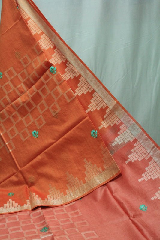 Embroidered festive orange and pink saree with zari work