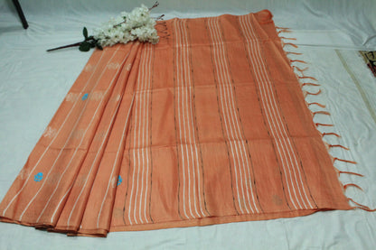 embroidered orange color saree with white pattern