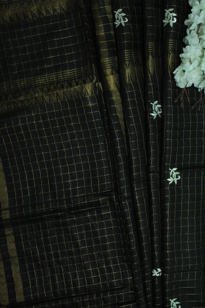 Embroidered golden zari work black color saree