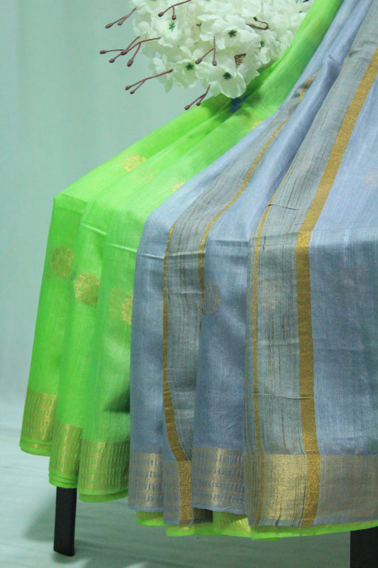 Emboidered green saree with gold patterns