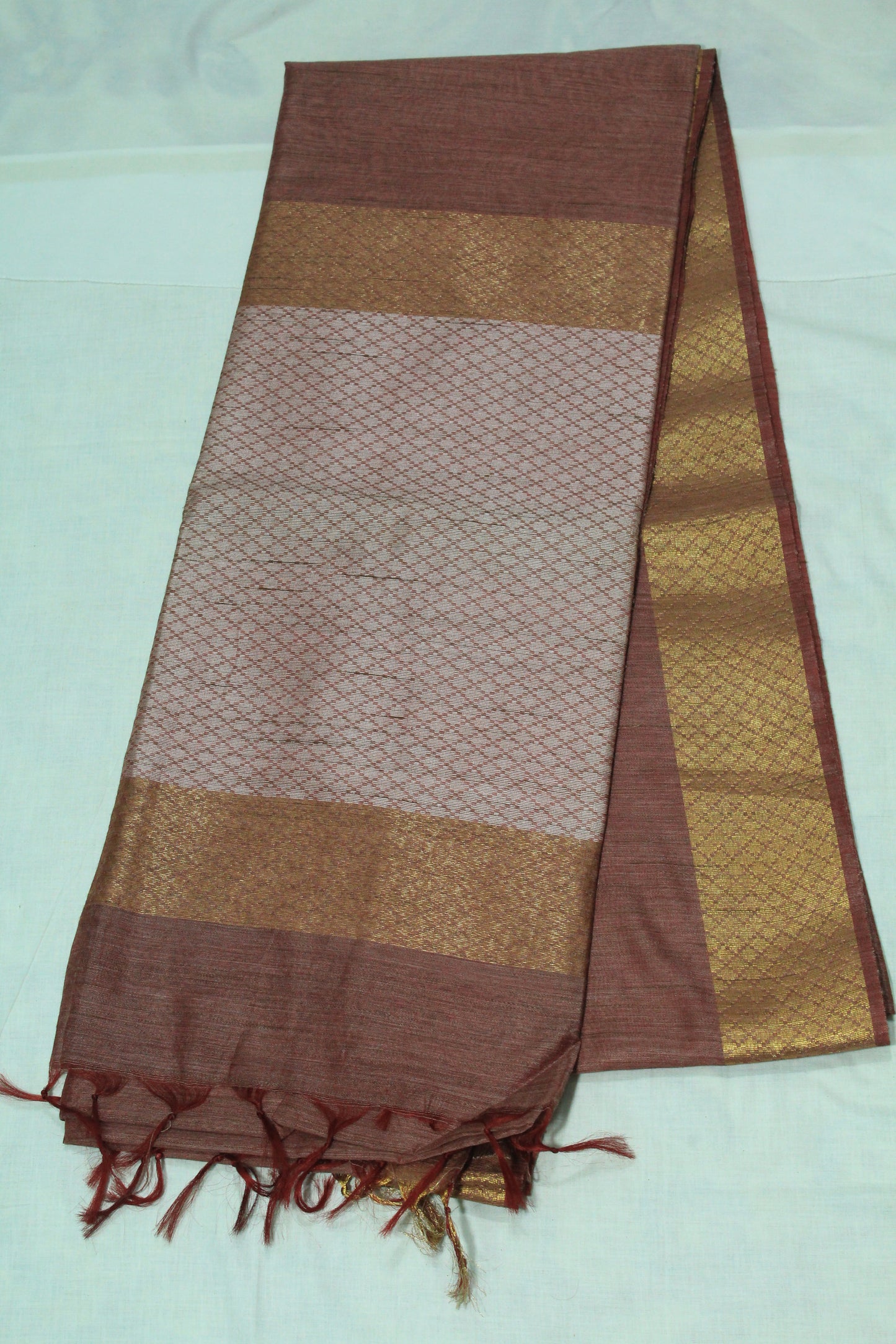 Maroon color plain bordered saree