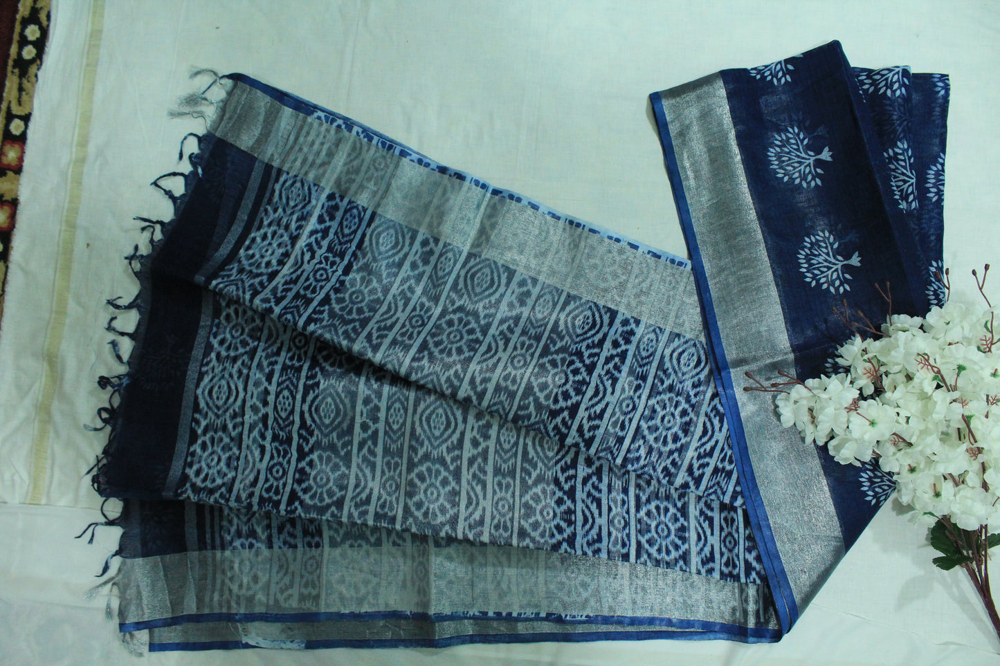 Blue color linen saree with floral print in white pattern