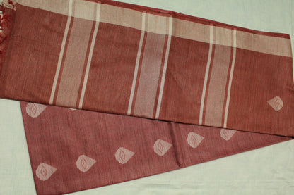 Red saree with white patterns in Silk fabric