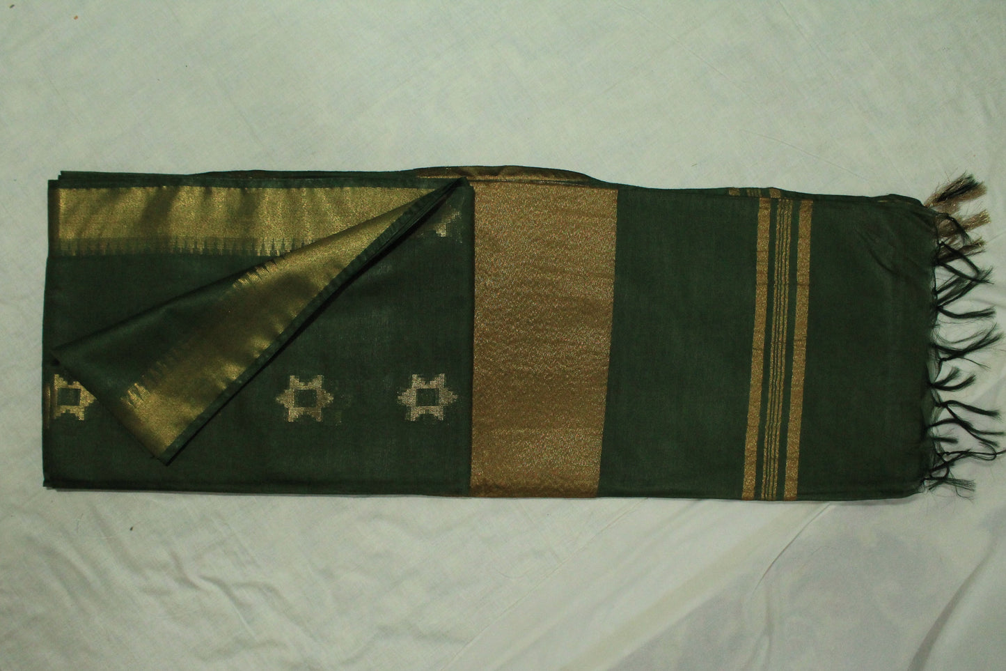 Festive wear green saree with wide golden border