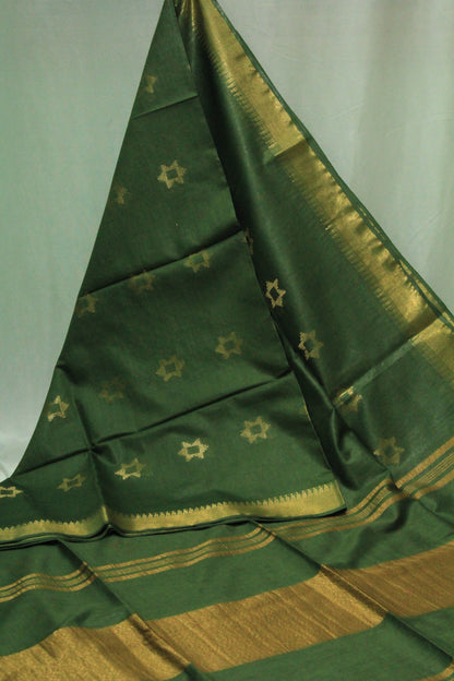 Festive wear green saree with wide golden border